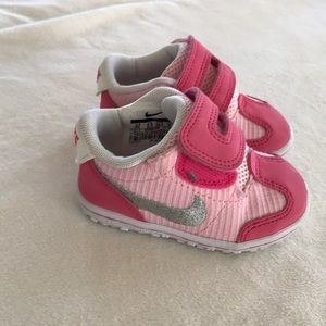 Pink baby Nike shoes